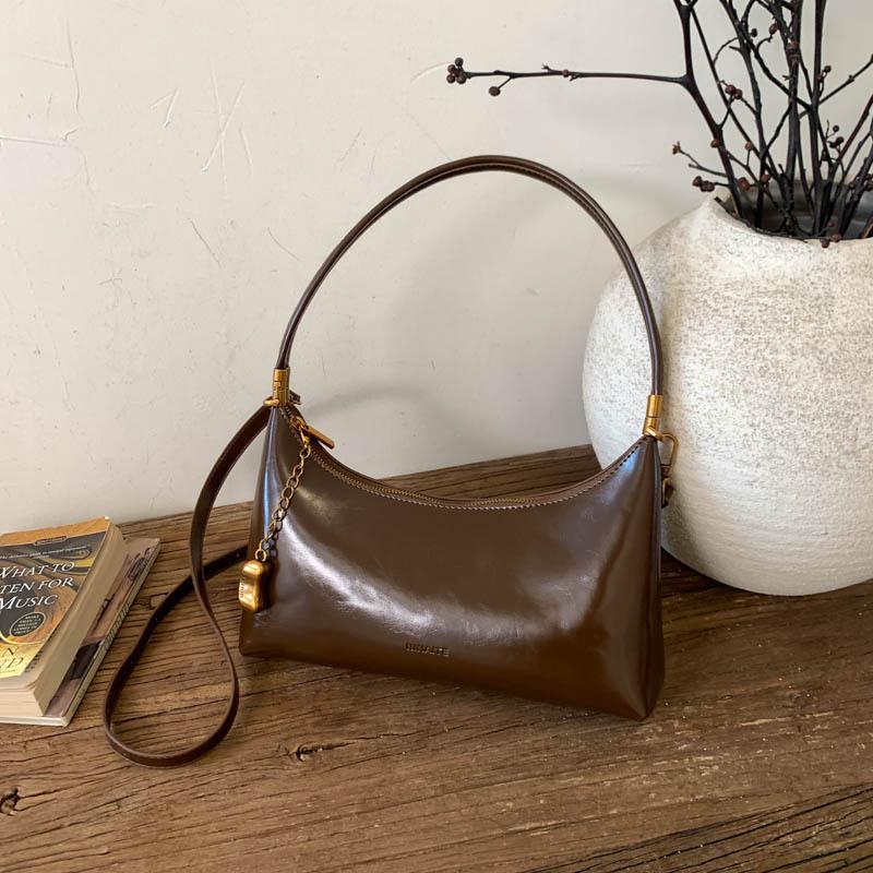 Autumn new high-value retro niche underarm atmosphere shoulder bag women's shopping commuter messenger bag bag