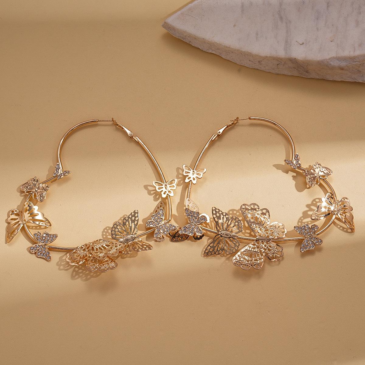 Metal diamond-set butterfly love silver needle earrings personalized fashion light luxury earrings