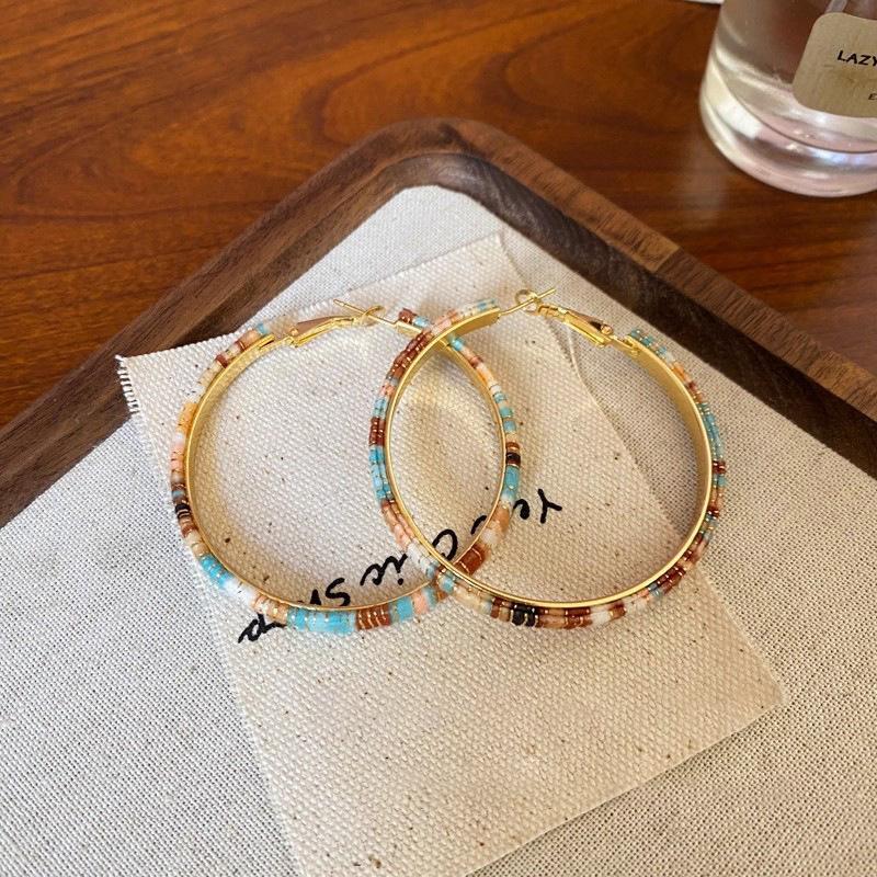 

Retro Hong Kong style splicing contrasting color color circle earrings design sense personalized earrings advanced sense temperament antique earrings 925 silver needle