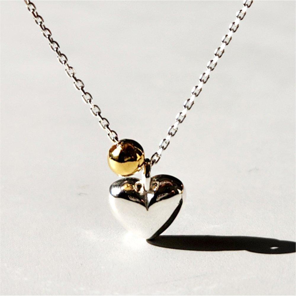 Two-tone Silver Necklace with a Heart Ball