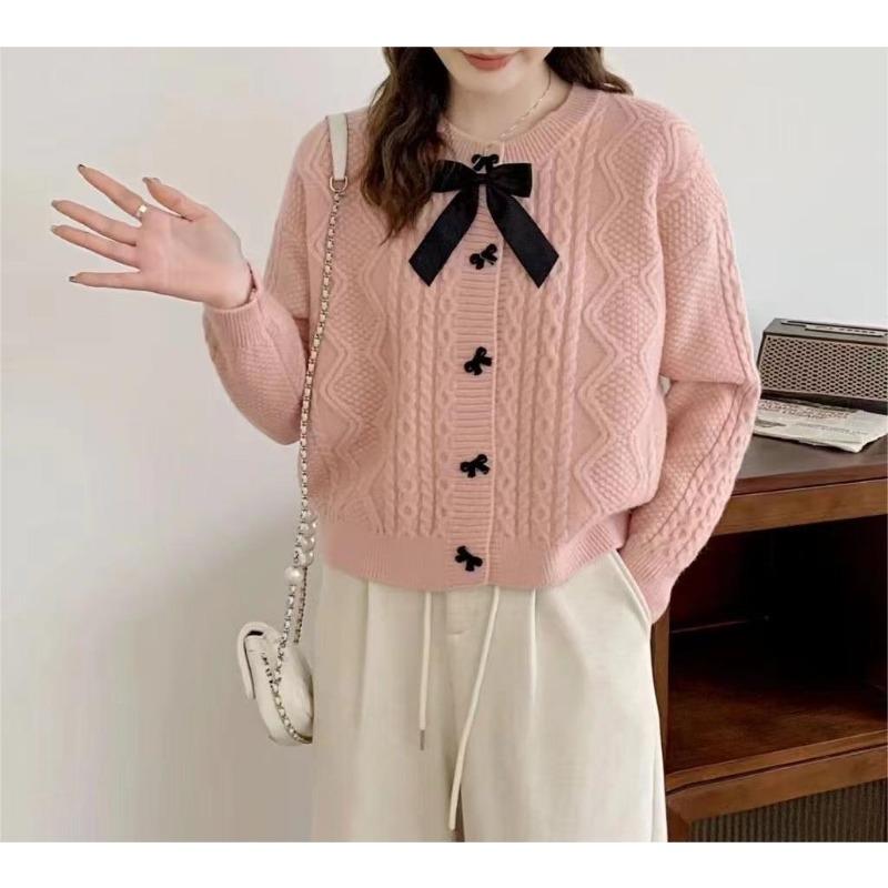 Solid color knitted cardigan women's new autumn and winter bow button with twist sweater jacket