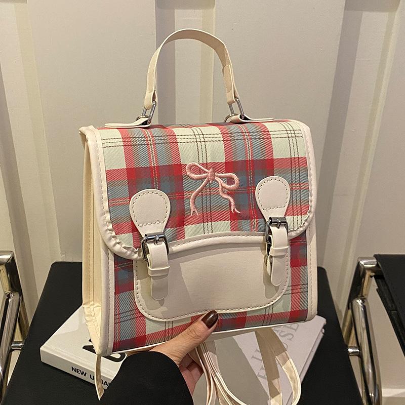 

Casual versatile niche plaid women s backpack 2024 new small backpack contrasting color mini portable small schoolbag білий