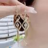 Pair of Elegant Tassel Earrings for Women - Gold-plated Copper with Shiny Pendant, Paired with Synthetic Zircon for a Fashionable and Luxurious Look