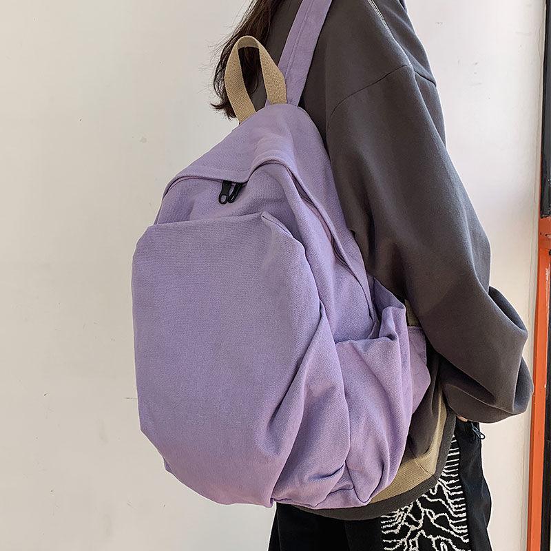 2025 Durable Canvas Solid Color Backpack for Female College Students - Korean and Japanese Style Travel Schoolbag