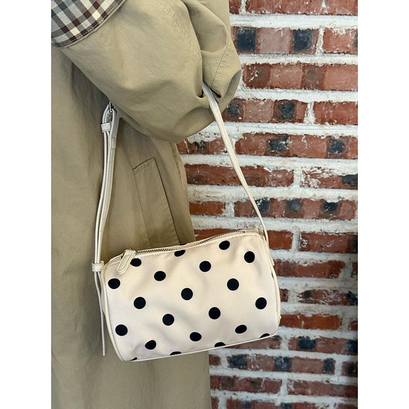 Korean polka dot toast handbag women's 2025 new niche design shoulder bag high value versatile armpit bag