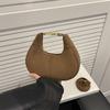 Retro matte handbag, foreign style, high-end dumpling hand carry small bag 2025 niche popular messenger mouth red envelope