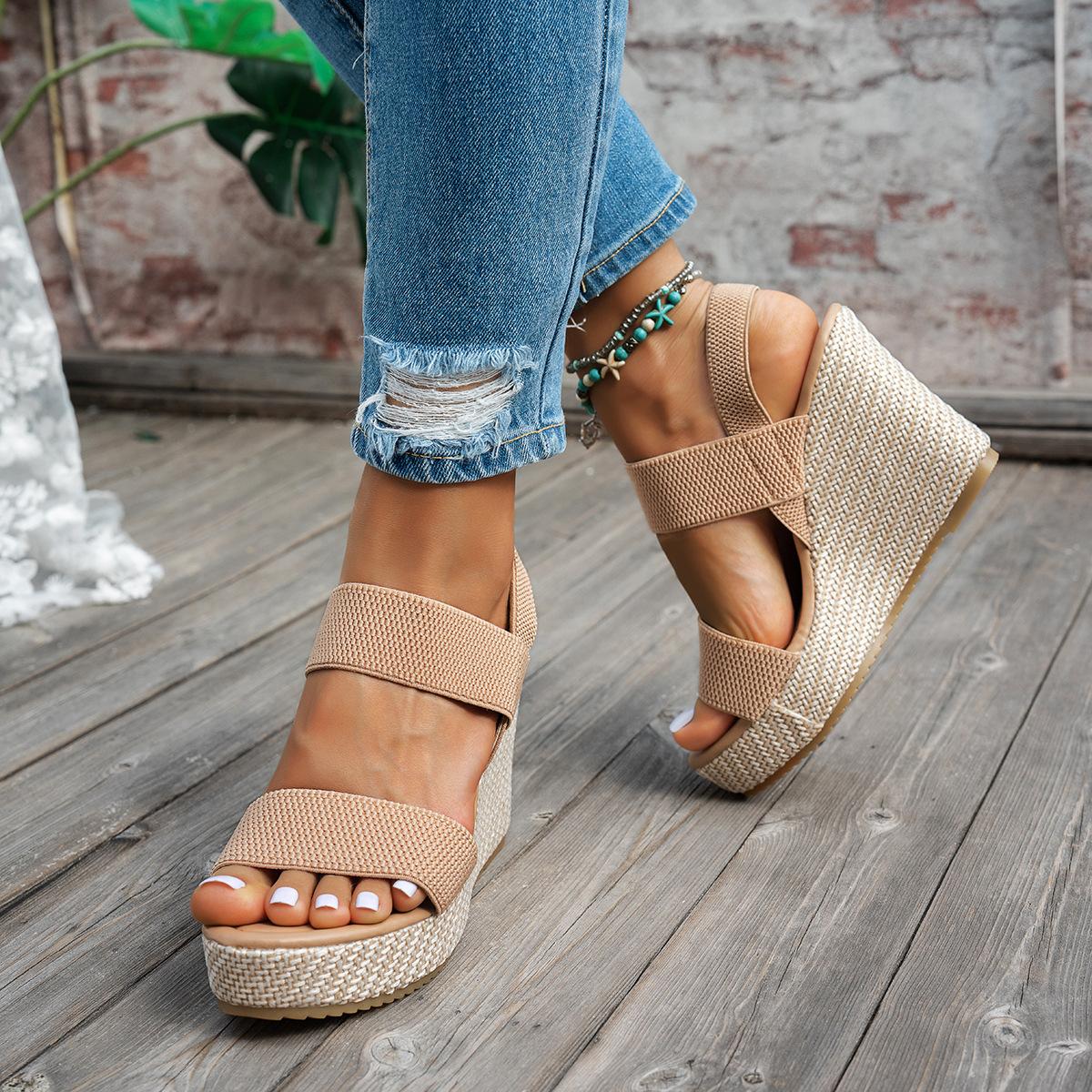 

Large size waterproof table fish mouth elastic sandals women s spot wedge heel sandals women s 2025 summer new cross belt 43