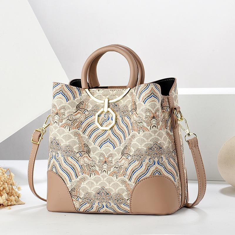 Printed handbag, high-end large-capacity fashionable and versatile women's bag, simple texture bucket bag, shoulder messenger bag.