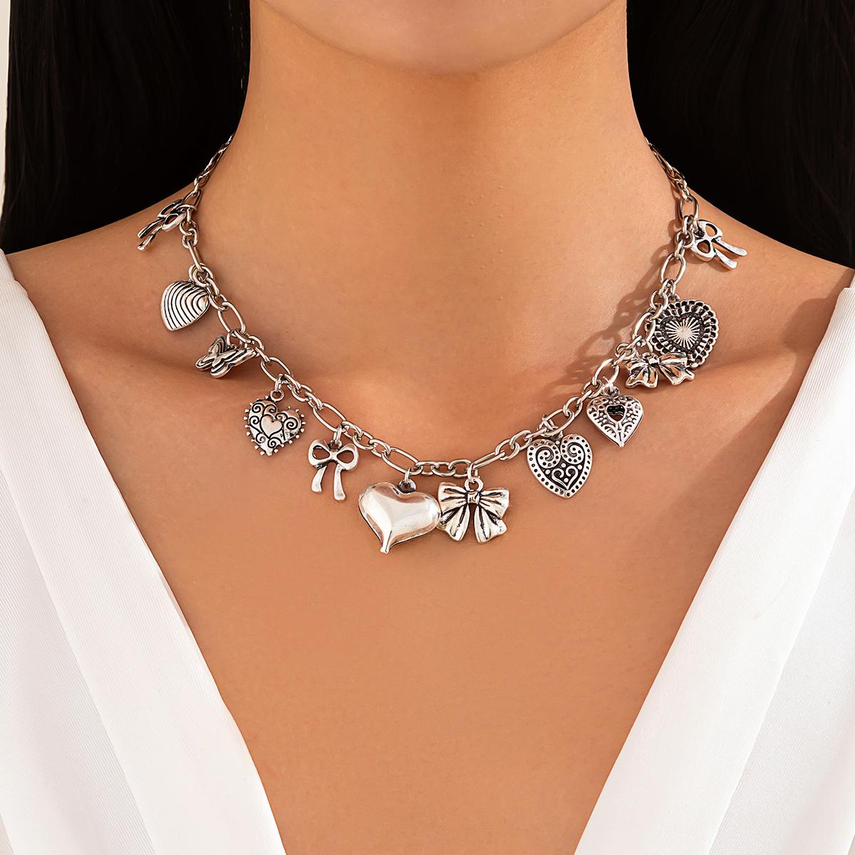 

Ingemark Vintage Love Heart Bow Conch Pendant Choker Necklace for Women Goth Adjustable Metal Clavicle Chain Neck Jewelry Gift