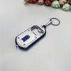 Ouvre-bouteille LED Multifonctionnel Mini Lampe de Poche Illuminée Porte-clés Pendentif