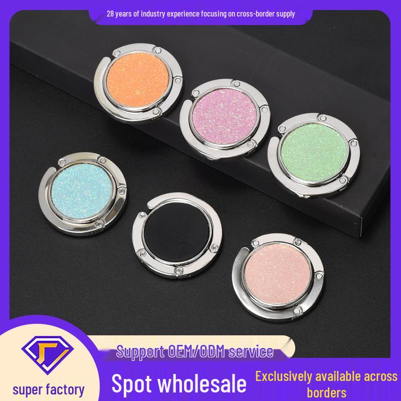 Kulatý skládací háček na kabelku – Přenosný kreativní věšák na batoh na okraj stolu.