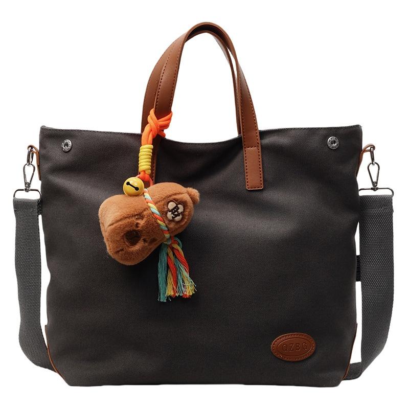 

Трансграничная женская сумка большой вместимости, новая коллекция 2025 года, простая студенческая сумка через плечо, повседневная универсальная сумка-мессенджер single package чёрный