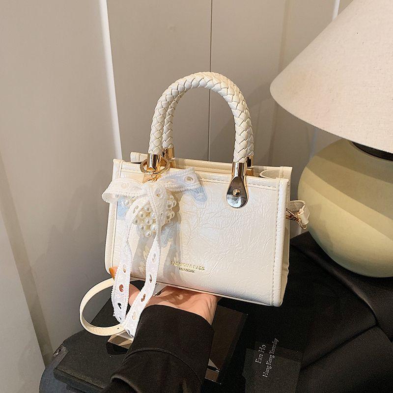 

Популярная популярная сумка этого года Женская 2025 Новая высококачественная универсальная сумка-мессенджер Модная супер популярная портативная маленькая сумка для переноски Rice White