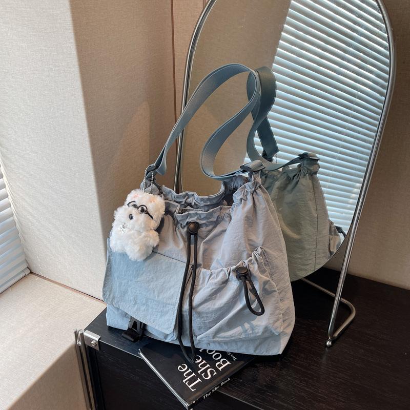 Cloth bag women's large-capacity new summer leisure niche drawstring single shoulder crossbody commuter tote bag