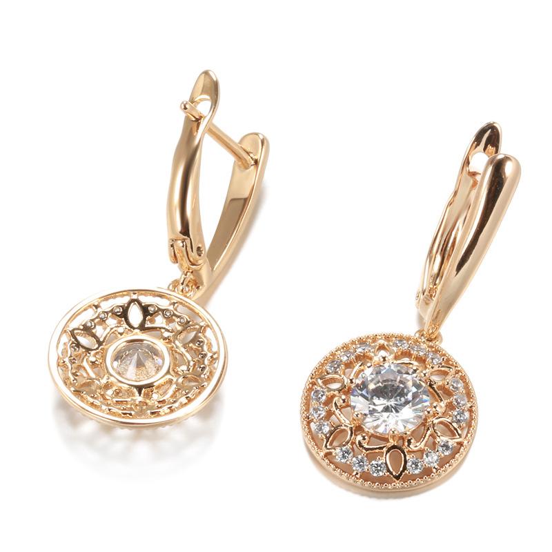 Autumn and winter fashion micro-inlaid zircon ear buckle 585 rose gold hollow flower earrings women