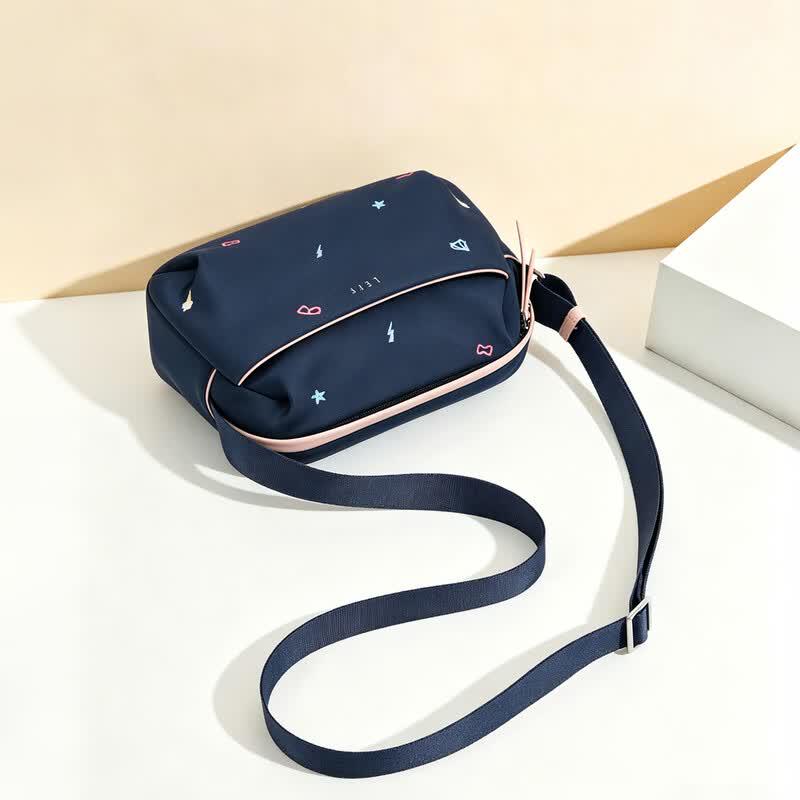 Embroidered Canvas Crossbody Pillow Bag