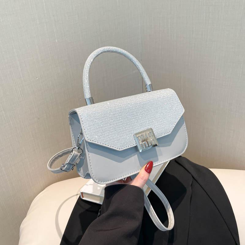 

New design light luxury high-end temperament versatile urban commuting shoulder messenger bag solid color popular women s bag серебряный