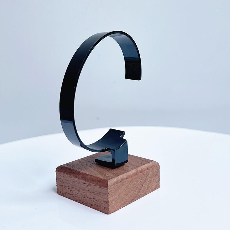 Kratzfester Holz-C-förmiger Uhrenhalter 1 Stück Schmuck-Ausstellungsständer für Armbandgeschäft Vitrinenverwendung