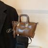 Retro texture small bag women 2025 new portable pillow bag premium versatile commuter messenger bag