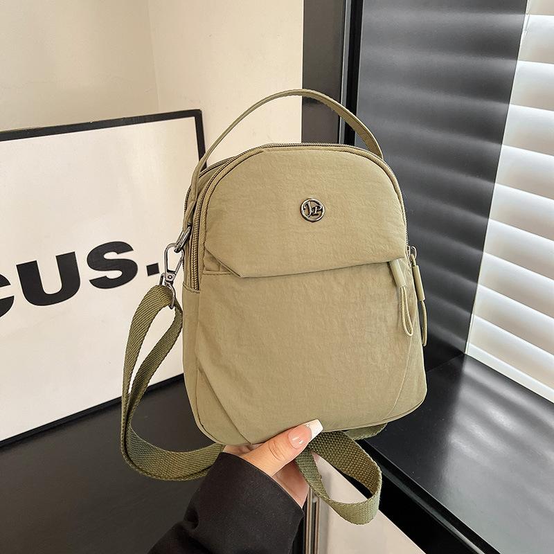 New nylon cloth mini mobile phone bag, female trendy small bag, light portable, simple and fashionable shoulder messenger bag.