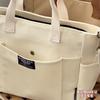 Borsa tote portatile per studentesse urbane minimaliste, grande capacità, pendolarismo, tela orizzontale, spalla singola, croce diagonale