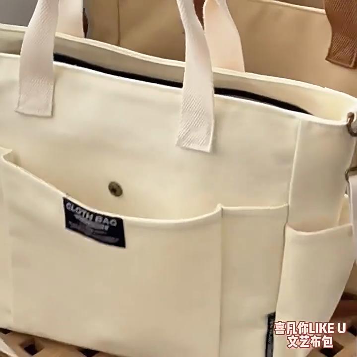 Borsa tote portatile per studentesse urbane minimaliste, grande capacità, pendolarismo, tela orizzontale, spalla singola, croce diagonale