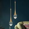 Luxury Crystal Pendant Light: Elegant Bedside or Background Illumination