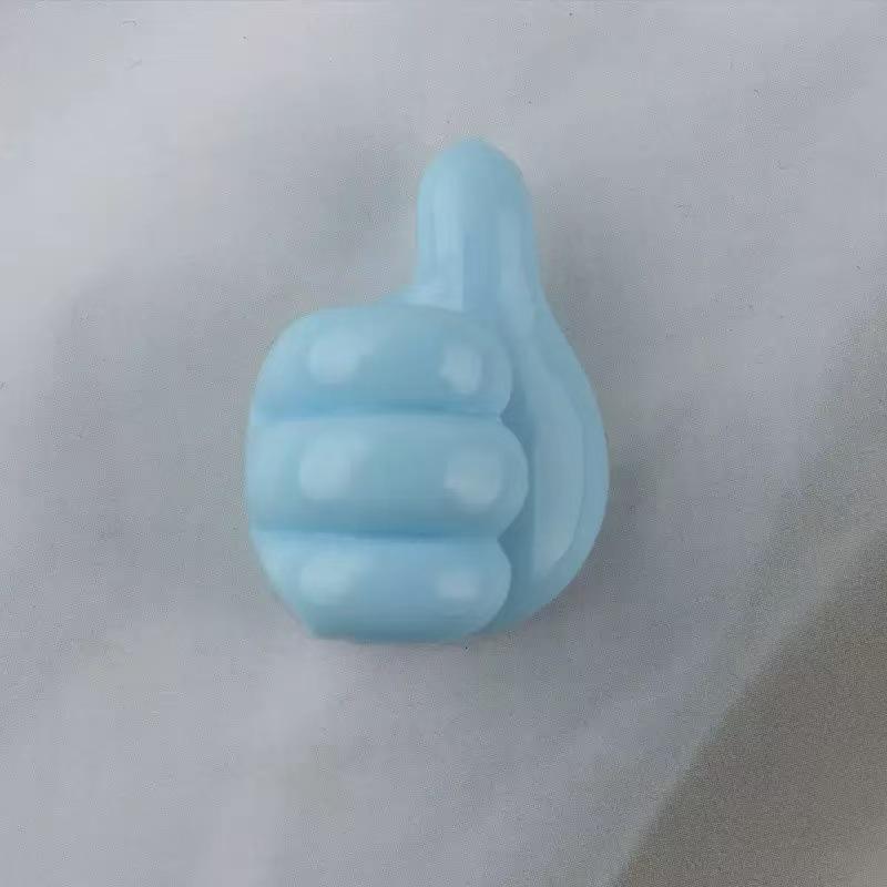 Organiseur de câbles avec crochet pour le pouce – Solution créative, mignonne, adhésive et sans perforation pour le rangement des câbles