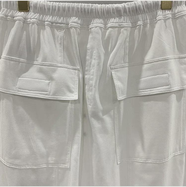 SUBHUMAN Pánská tmavá série: Slonově bílé zkrácené harémové pletené kalhoty - Letní ležérní móda