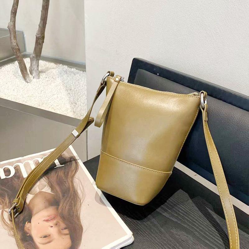Fashion bucket bag early spring new versatile women's shoulder bag niche design leather women's bag crossbody cosmetic bag