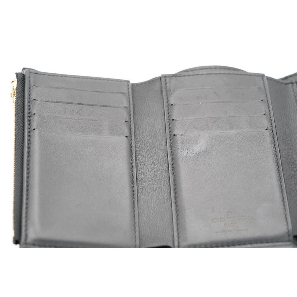 Used Louis Vuitton Capucines Noir Tri-fold Wallet