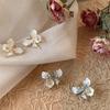 S925 Silbernadel-Ohrringe mit blauem Schmetterlingsmuster, elegantes, vielseitiges Blumendesign
