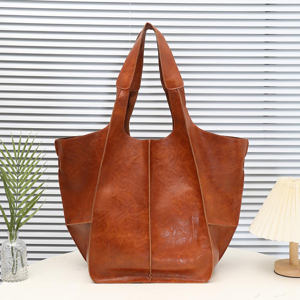 

Vintage tote bag women s 2025 new casual soft leather large shoulder handbag commuter wing bag верблюд