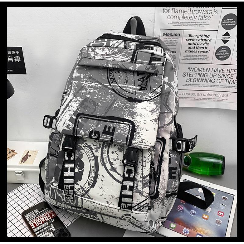 Mode Automne Cartable Personnalité Féminine Camouflage Graffiti Couple Sac à Dos Grande Capacité Sac à Dos Étudiant Masculin
