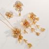 Exquisite 4-Piece Tassel Jewelry Set: Hollow Flower Necklace, Earrings, Bracelet & Ring