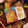 100 PCS Holographic Christmas Stickers - Gold PET Decals for Gifts, Journals, Glass Decor