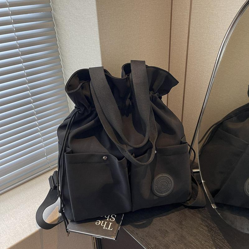 

Shoulder bag for girls, high-end fashion and lightweight backpack, large-capacity work commute short-distance travel bag for college students single pack чёрный