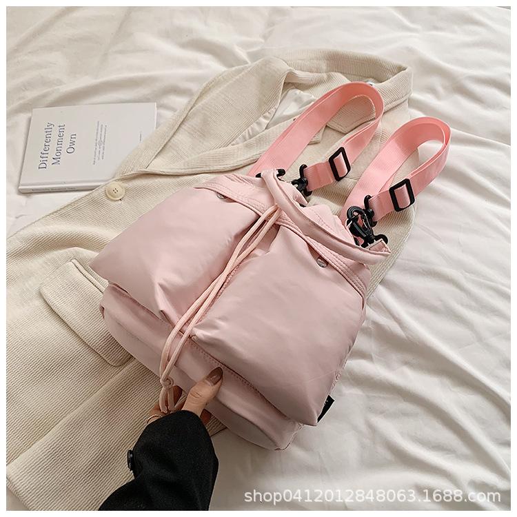 

Casual niche messenger bucket bag women s 2025 new fashion commuter shoulder bag Korean version travel backpack рожевий