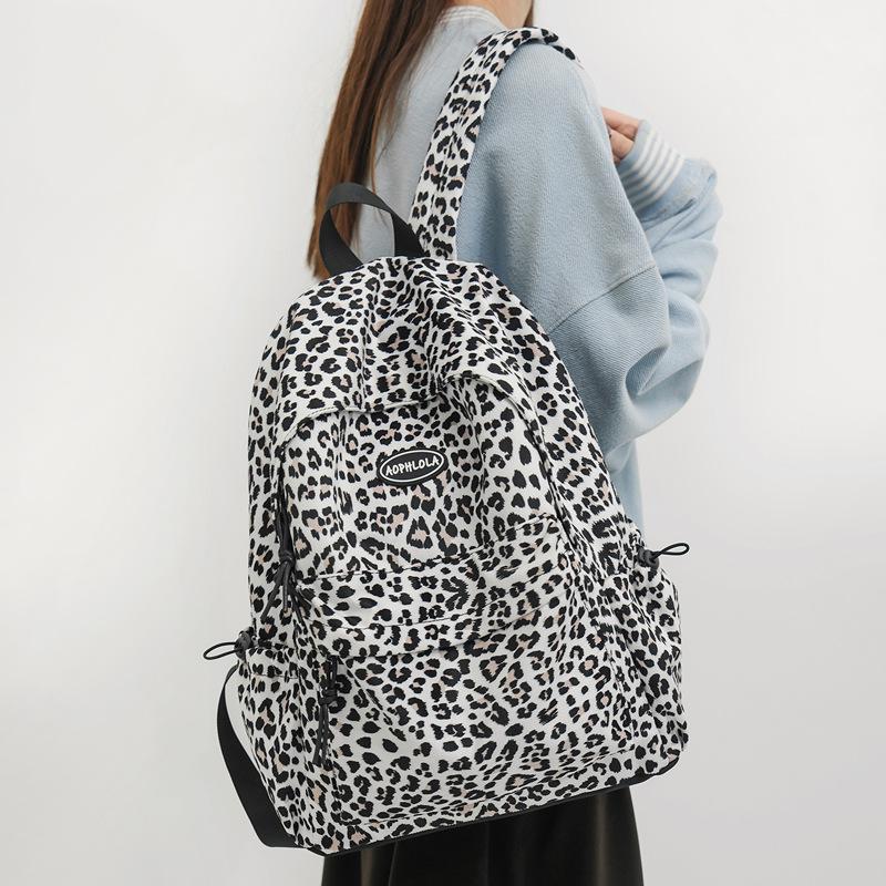 SchoolbagYX high-value leopard print backpack female college student daily commuter backpack high school junior high school large-capacity schoolbag