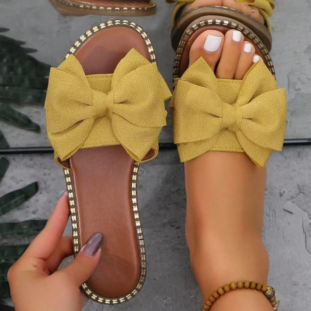 2026 New Flat Bottomed Rhinestone Bow Straight Slippers for Women Wearing Solid Color Lightweight Cloth Surface Sandals