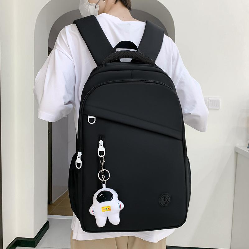 

New student schoolbag, girls large-capacity weight reduction, light solid color simple junior high school backpack чорний