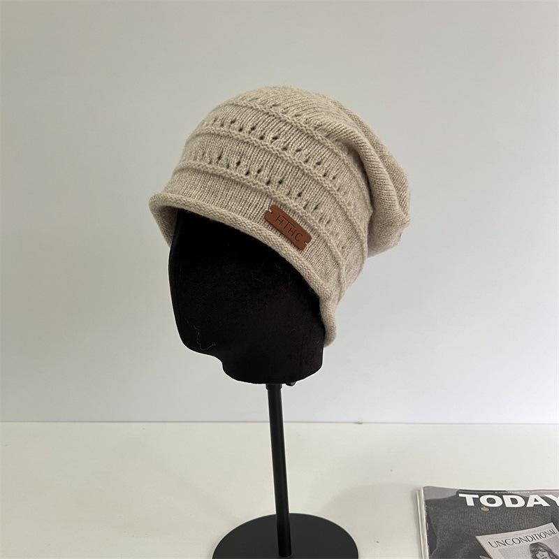 

Quality wool knitted hat autumn and winter loose push hat women s big head circumference showing face small warm ear protection confinement hat M（56-58cm） сірий колір