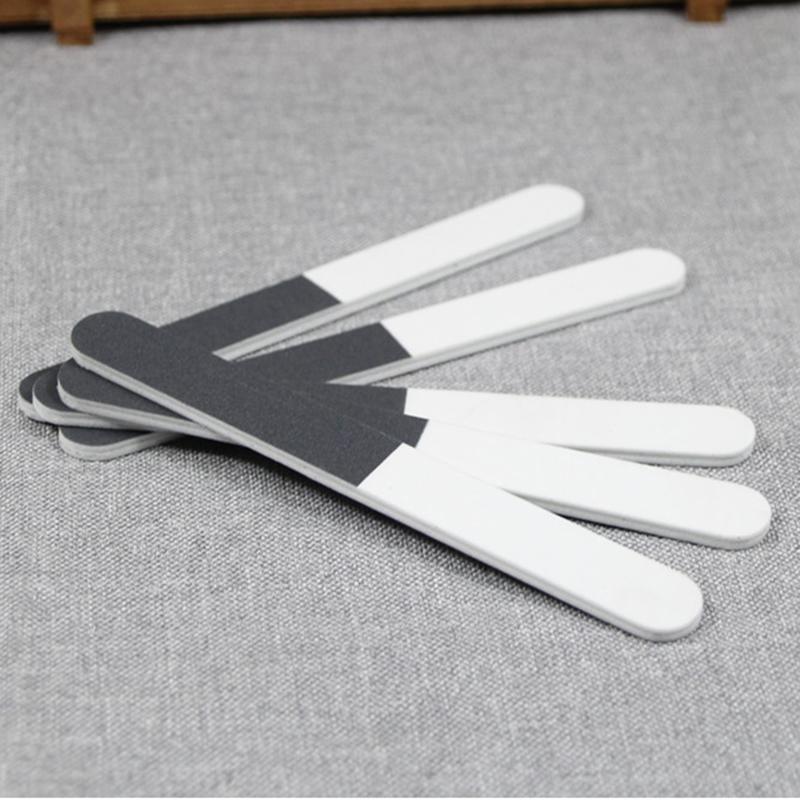 

Long-Lasting Triple-Sided Nail File and Buffer Set in Black, White and Gray Colors