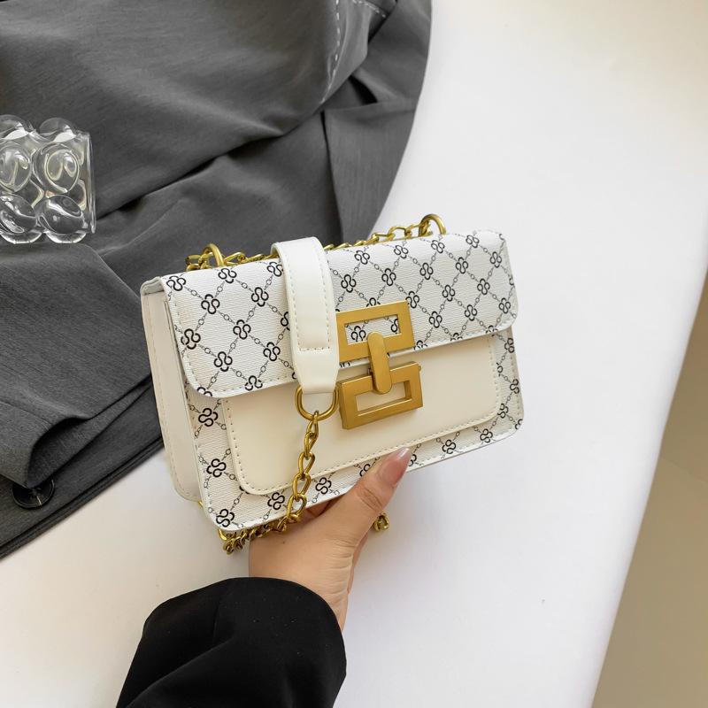 

Легкая роскошная модная и красивая сумка для поездок на работу, корейская версия летней новой нишевой дизайнерской трендовой небольшой квадратной сумки через плечо