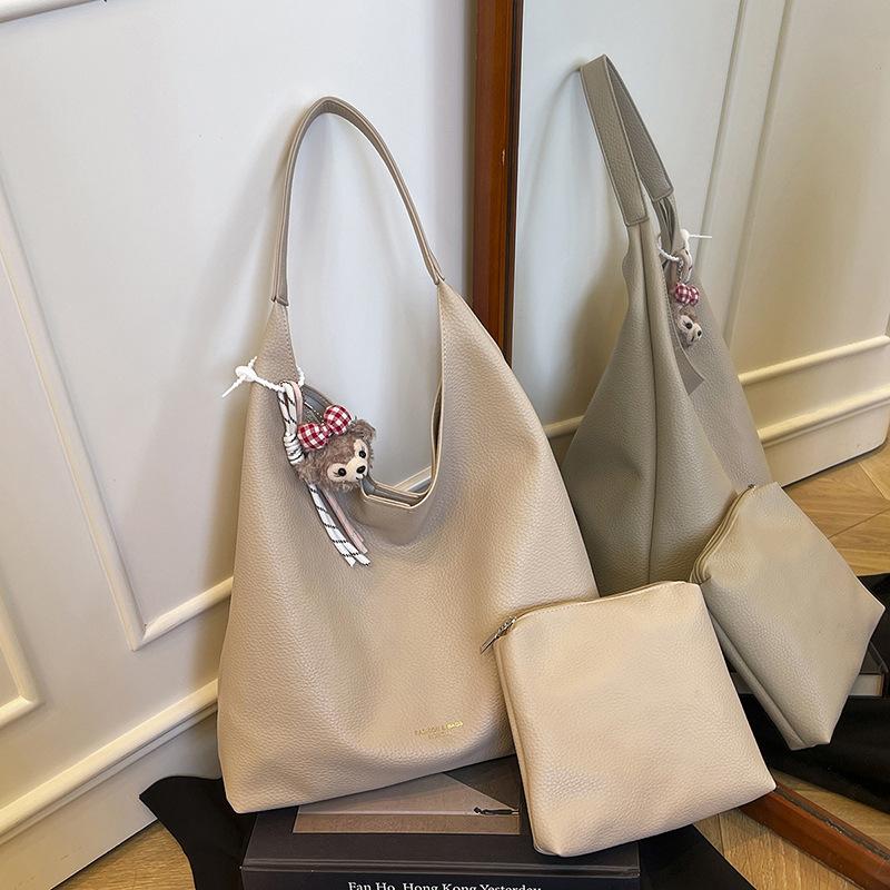 

Versatile bag women s large capacity 2025 new summer shoulder mother and child bag leisure work tote bag