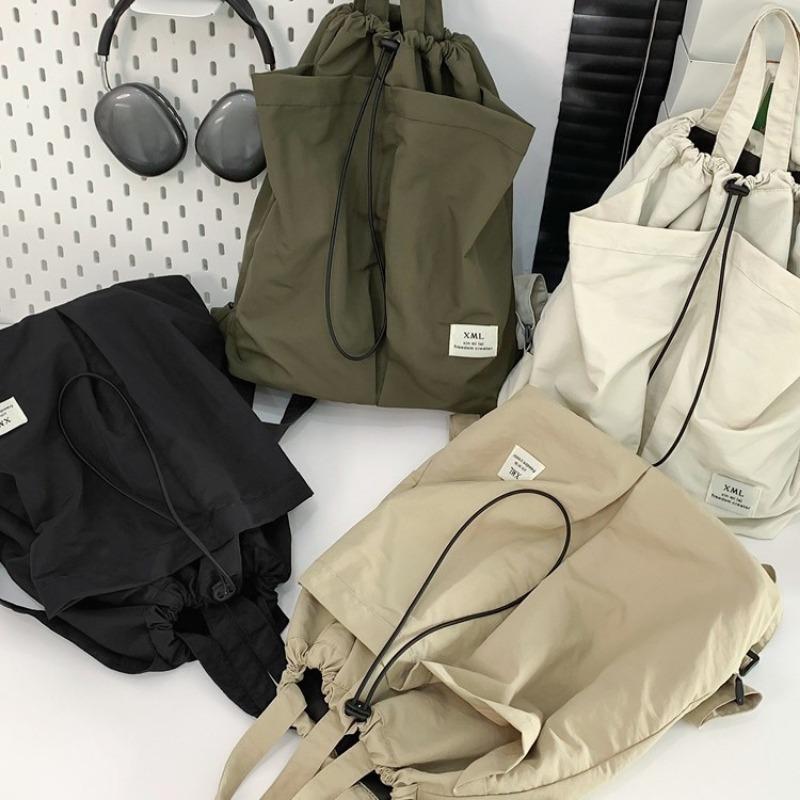 School bag casual lightweight nylon wear-resistant backpack lazy wind large capacity multi-functional handbag student bag