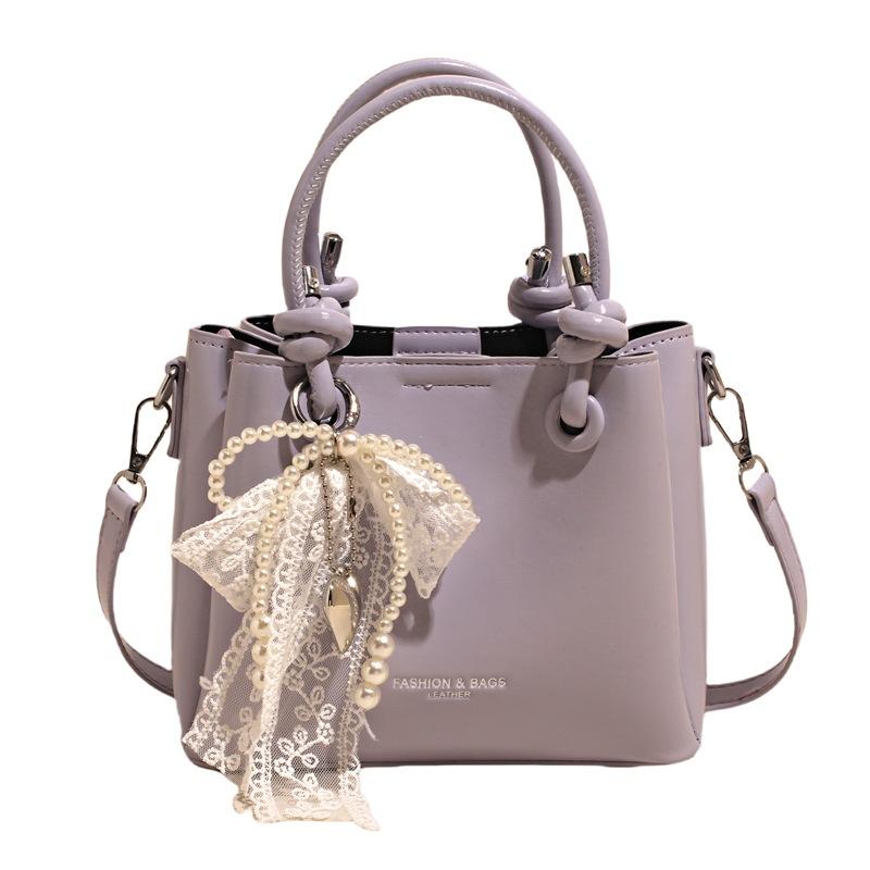 This year's new product is fashionable, simple, personalized and versatile, portable bucket bag, women's daily commuting and leisure, high-end messeng