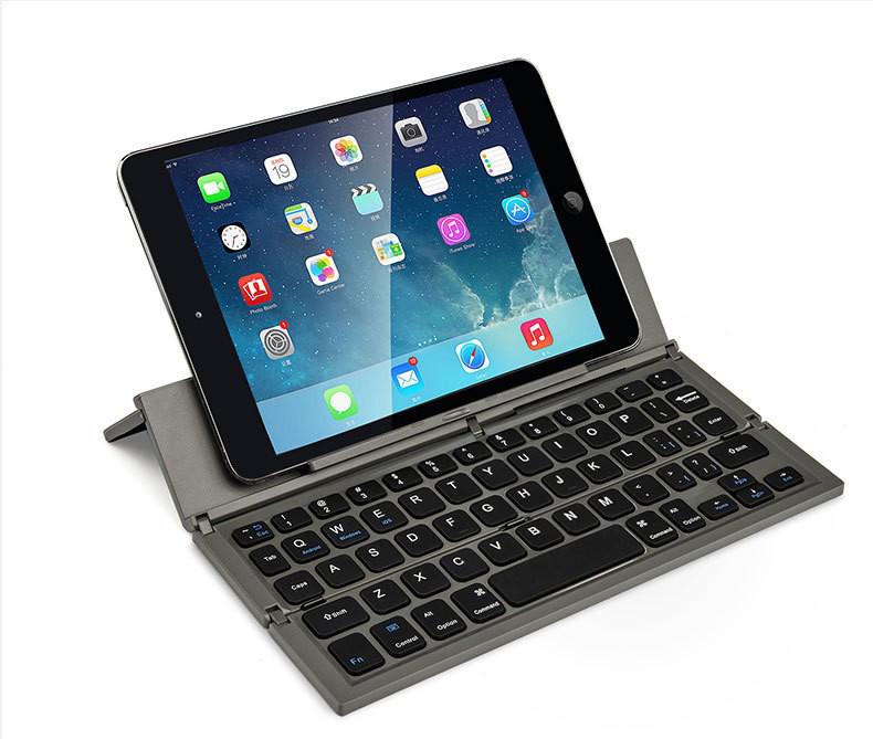 

Portable Rechargeable Foldable Bluetooth Keyboard for Phone, Tablet & Laptop сірий колір