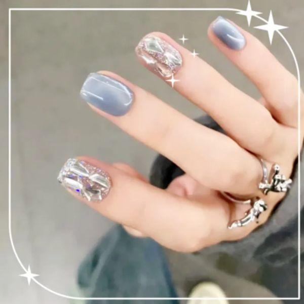 

ELIVLT Daily Short-Long Design Self-Adhesive Nail Tips 24P 1 Set ICE BLUE CATEYE