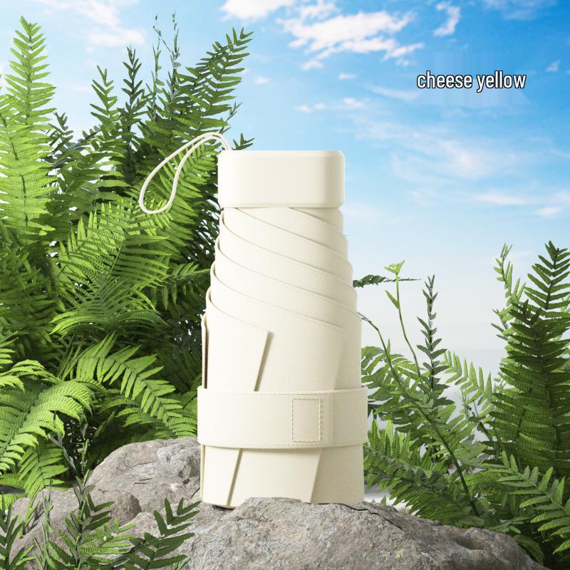 

Compact Ultralight Dual-Use Mini Umbrella: Portable Anti-UV Sunshade for Women, Perfect for Sunny and Rainy Days
